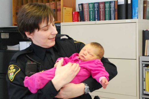 Constable Lobinowich with baby Kyra